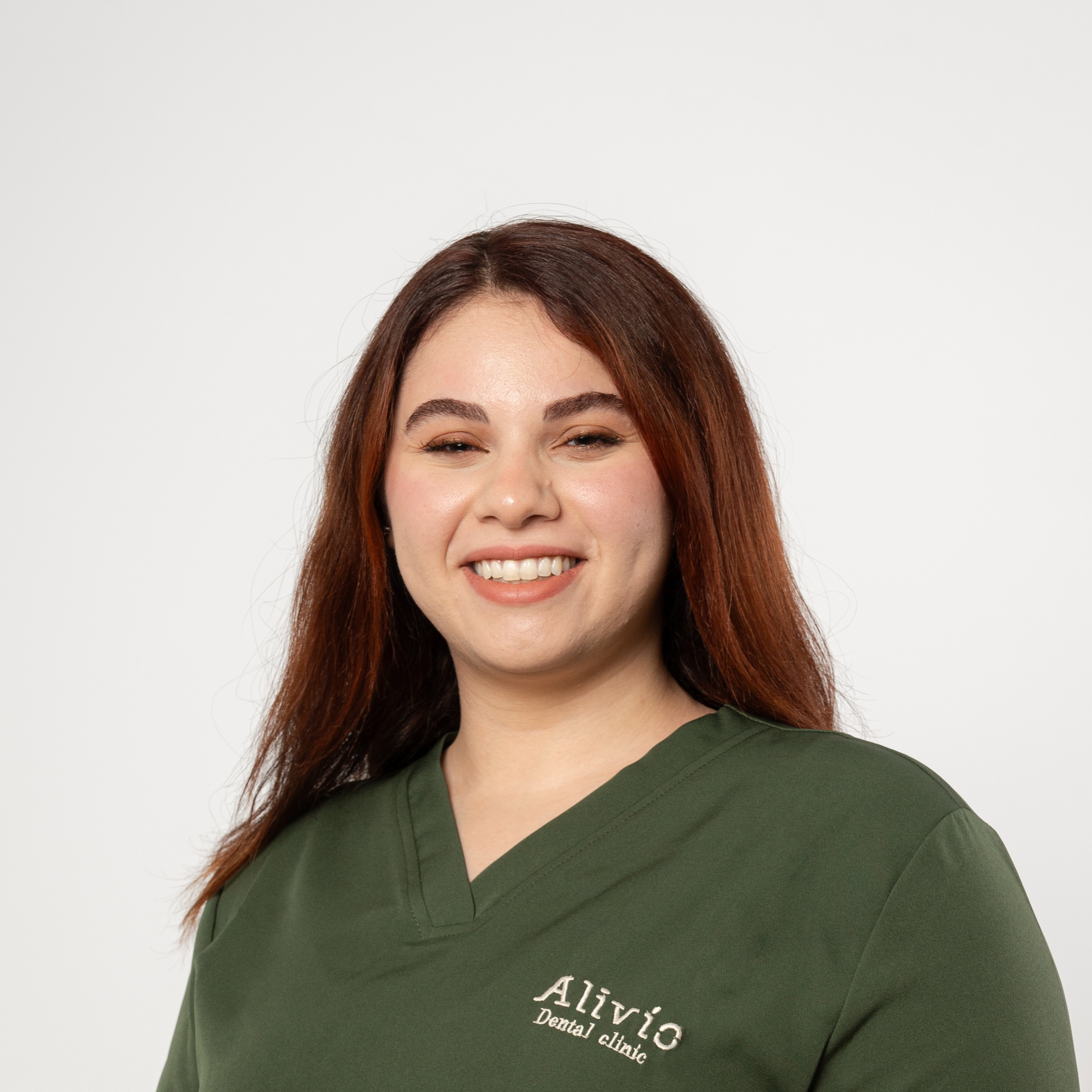 Dr. Yasmine Hossam, prosthodontist and postgraduate dental instructor at Alivio Dental Clinic
